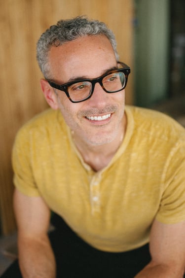 Casey Murphy headshot glasses