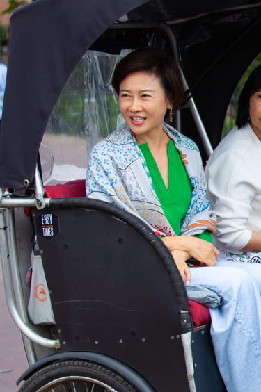 chinese woman on bike taxi