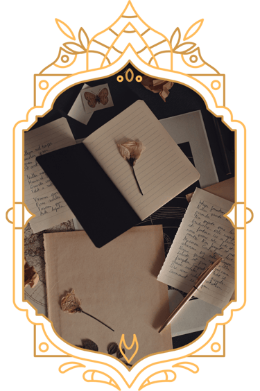 notebooks and roses in a victorian frame