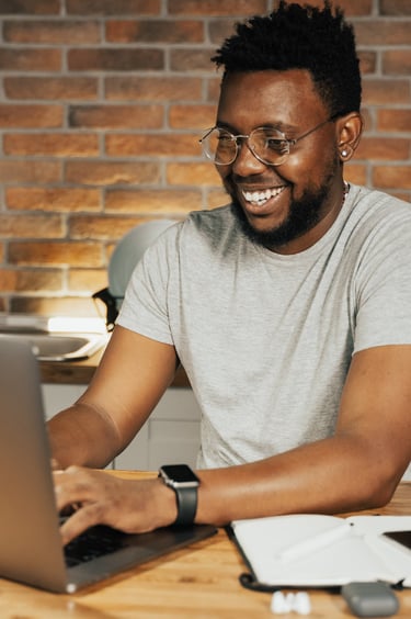 man working on his computer