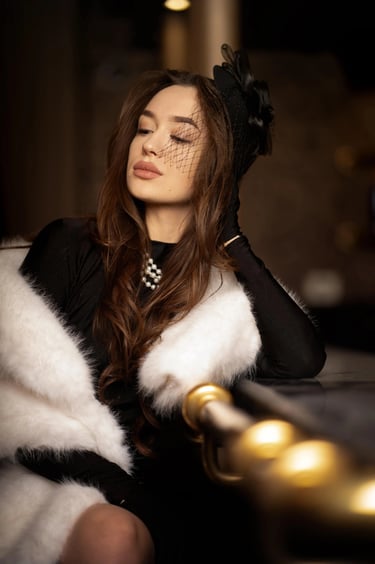 Old hollywood style portrait photo of a woman with long fur sitting at the bar