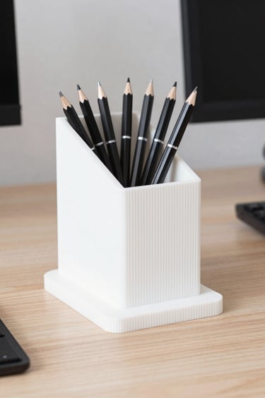 Close-up of a beautifully designed desk organizer holding pens and notes, showcasing Formaviva’s craftsmanship.