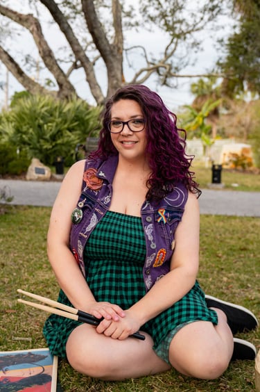 Self portrait, purple hair, smiling, green dress, purple vest