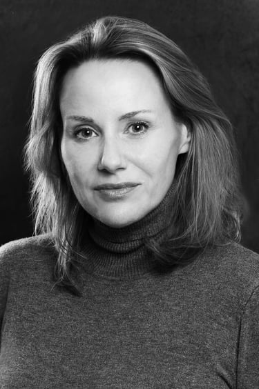 a woman in a turtle neck sweater and turtle neck sweater