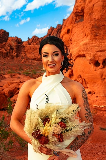 a woman in a white dress holding a bouquet
