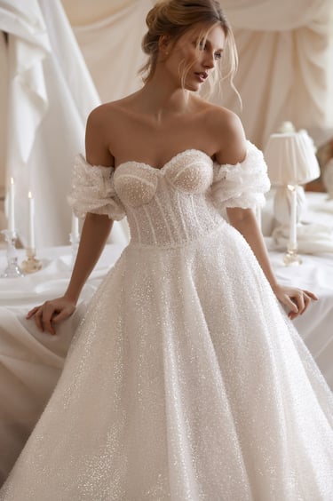 a woman in a white dress with a white dress