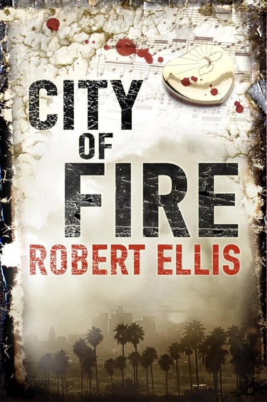 Cover of the UK edition of 'City of Fire' by Robert Ellis, featuring a dramatic image of Los Angeles buried in smoke.