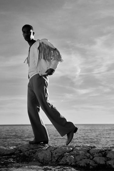 man standing in front of the sea in endoume marseille