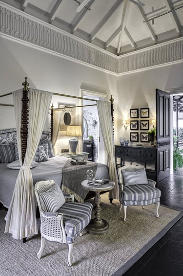 a bedroom with a canopy bed and a canopy bed