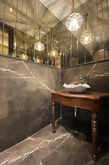 a bathroom with a mirror and a sink