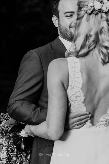 Groom looking at the bride.