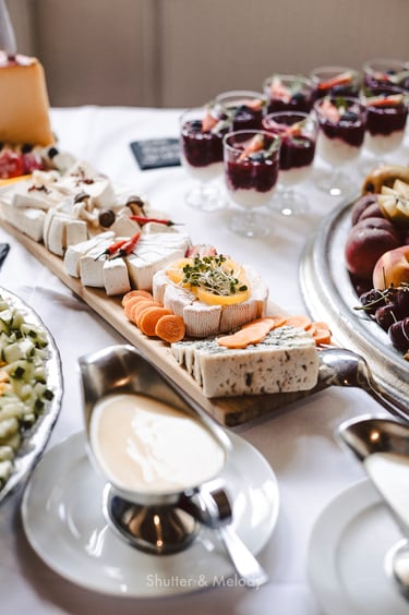 A cheese board laid out on a table.