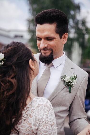 Bride and groom dancing together.