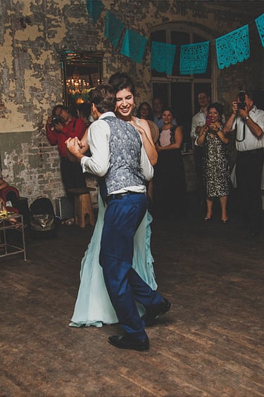First dance of the bride and groom on the dance floor.