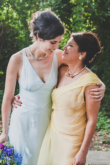 An outdoor portrait of a bride and her mother.