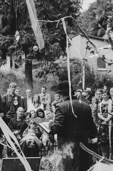 Officiant speaking at an outdoor wedding.