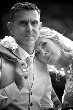 a man and woman posing for a photo