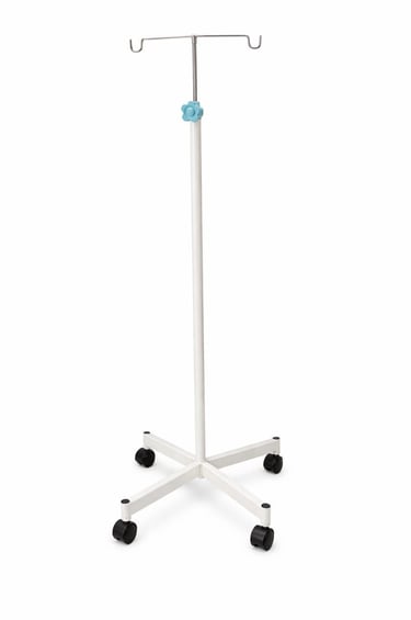 Portable white medical IV pole with four hooks and a rolling caster base for hospitals.