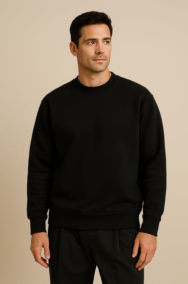 a man in a black sweater and pants