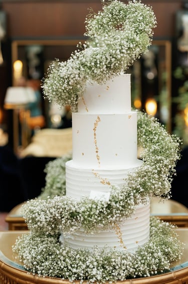 wedding cake with tornado of flowers
