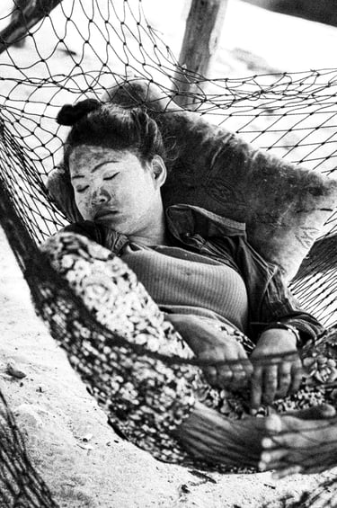 Bajau Laut, Sabah. Woman sleeping in a hammock