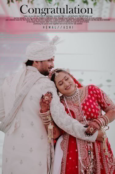 Romantic Indian wedding couple pose, bride in red lehenga leaning on groom in white sherwani. Makeup