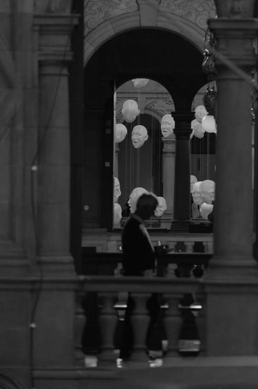 "Hang in There" - Floating Heads installation. Kelvingrove Museum, Glasgow, Scotland
