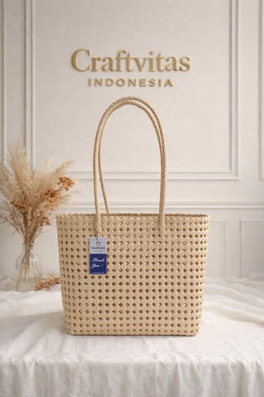 Handmade woven plastic tote bag Sekar series in cream color by Craftvitas Indonesia, eco friendly artisan handbag