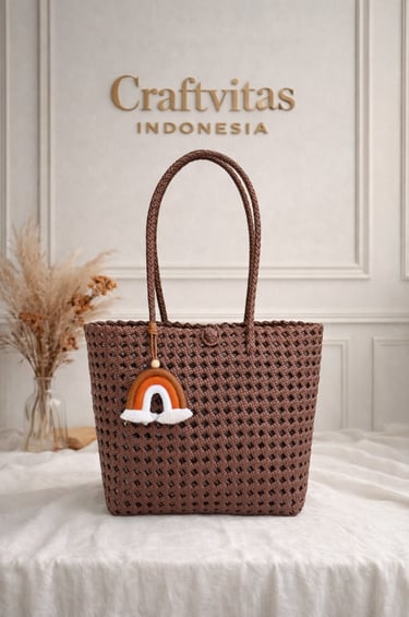 Brown handmade woven plastic tote bag Sekar series with charm detail, eco friendly fashion bag
