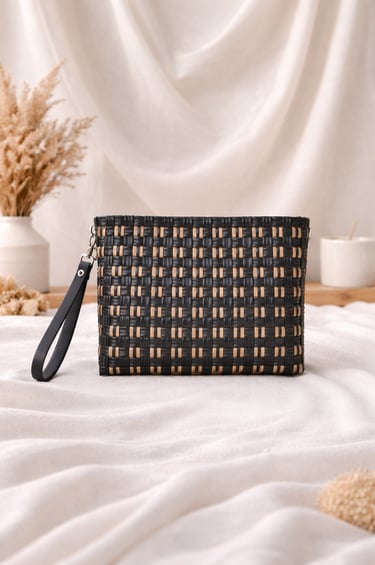 Black and gold checkered woven plastic clutch bag handmade by Craftvitas Indonesia