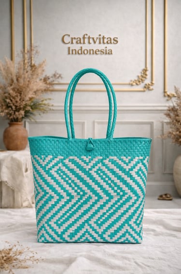 Eco friendly handwoven plastic tote bag with Indonesian batik chevron pattern in teal and white