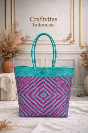 Handwoven plastic tote bag with large Indonesian batik diamond pattern in teal and pink