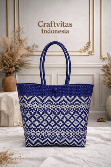 Handwoven plastic tote bag with Indonesian ethnic batik pattern in blue and white, sustainable handmade bag