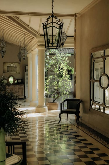 Traditional multi-generational estate gallery with checkered floors and upscale architectural detail