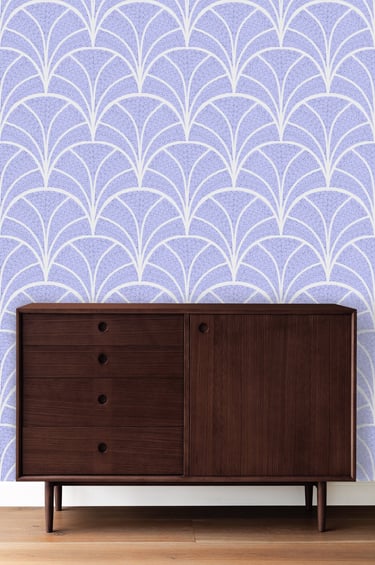 a cabinet with pastel wallpaper