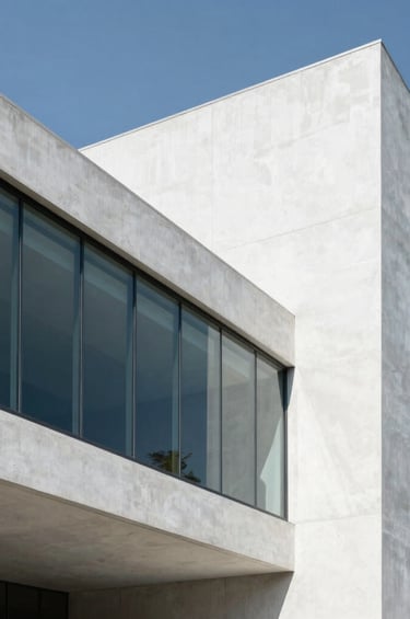 Minimalist architectural detail of a high-tech NGO headquarters in Mexico City, showcasing sharp angles, pristine white concrete, and transparent glass panels that symbolize data security and structural protection. Bright daylight creates clear shadows, conveying an authoritative, clean, and modern protective shield aesthetic.