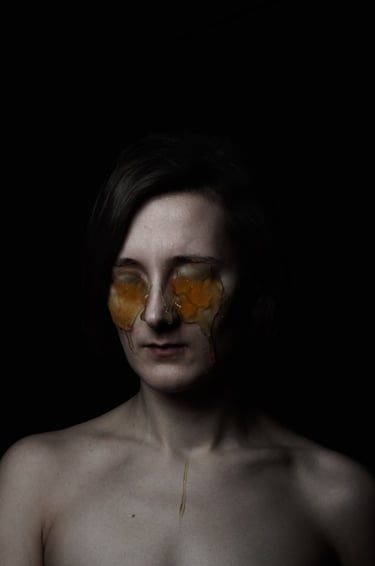 a woman with a face mask and a butterfly on her face