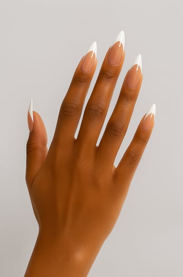 a women's hand with medium/long press on white tip nails