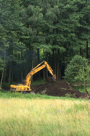 traktorius formuoja sodybos landšaftą
