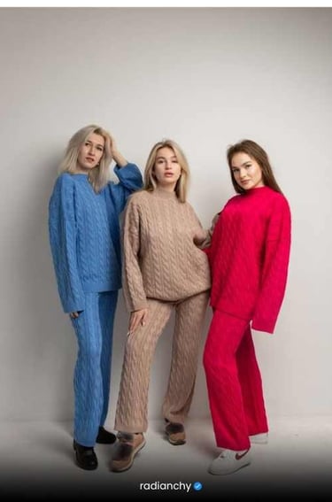 three women in matching knitted sweaters and matching sweaters