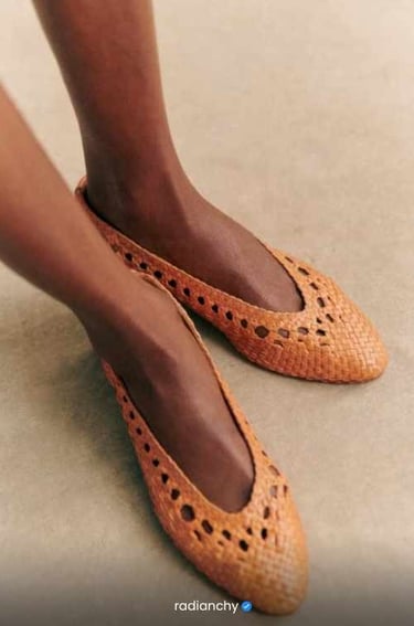 a woman's feet in a pair of shoes