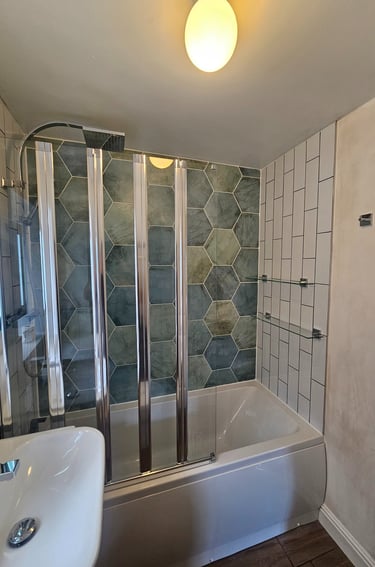 Selection of Nuova Home Improvements bathroom and kitchen projects, featuring walk‑in showers, frees