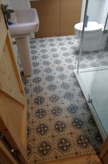 Selection of Nuova Home Improvements bathroom and kitchen projects, featuring walk‑in showers, frees