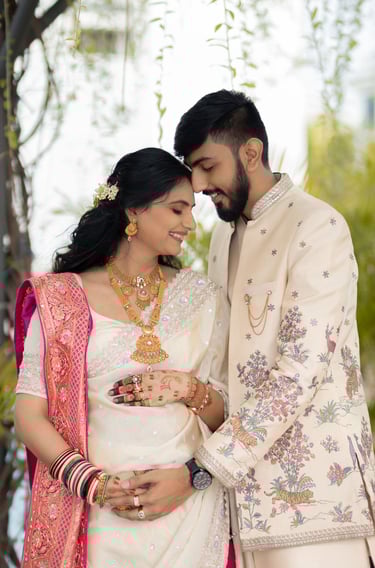 Beautiful baby shower bride in Vadodara smiling with natural glam makeup by R&D Bridal Studio, 