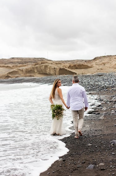 Intimate wedding moment captured on the scenic coastline of Tenerife