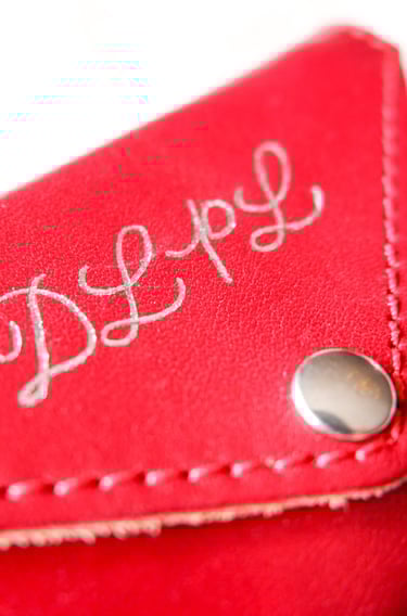 Leather purse personalized with initials using hot foiling by NYC calligrapher Handwritten by Belle.