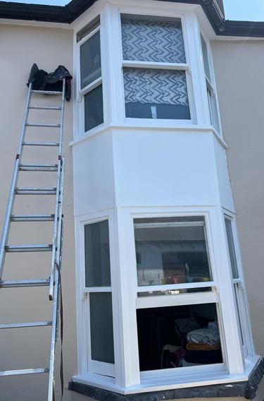 Bay window exterior painting in Worthing and Lancing Sussex, professional white finish