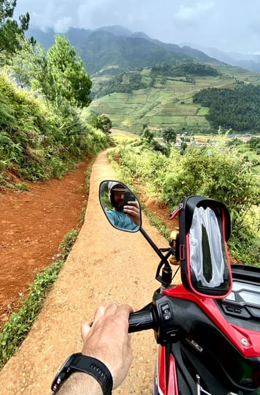 a person riding a motorcycle on a dirt road