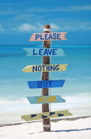 Sign that says Please Leave Nothing But Your Footprints