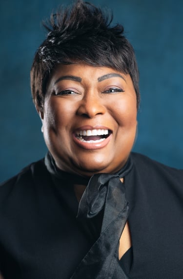 a woman with a black tie and a black tie